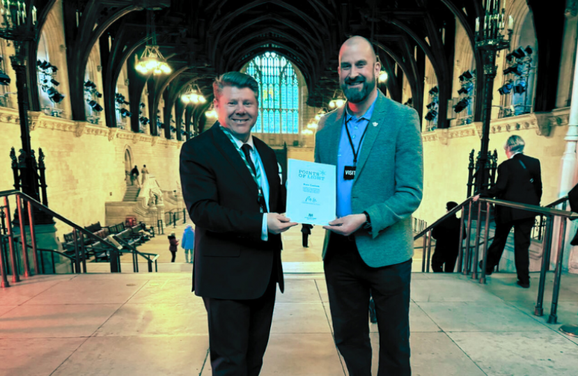 Dean Russell MP presents Points of Light Award to Ross Coniam