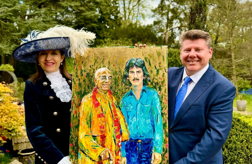 Dean Russell MP presents painting 