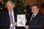 Boris Johnson and Dean Russell select winning Christmas card