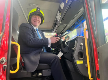 Dean Russell MP in a fire engine