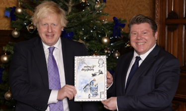 Boris Johnson and Dean Russell select winning Christmas card